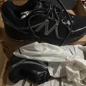 New Balance Black and White Running Shoes